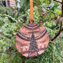 Load image into Gallery viewer, These beautiful Notre Dame Ornaments highlight Christmas Tree scenes from Notre Dame. The ornaments are 3 1/4" in diameter and feature beautiful full color stylized photos, imprinted on birch wood.