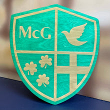 Load image into Gallery viewer, This McGlinn Hall Wall Sign is crafted of green-stained, laser-engraved birch, measures 14.25" x 16".