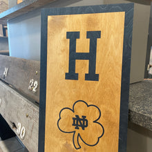 Load image into Gallery viewer, Our 40" x 12" x 1/2" Premium Notre Dame HOME Vertical Sign comes in two color ways: Gold on Blue