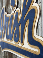 Load image into Gallery viewer, Our Premium Notre Dame Blue IRISH Wall Art will make an awesome addition to any home. It is assembled by hand with three separate colors of stained wood: whitewash, golden oak, and Notre Dame blue.