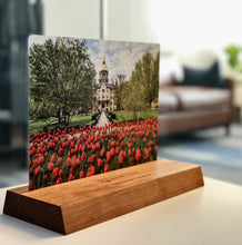 Load image into Gallery viewer, The photo (6" x 8") is printed on aluminum and sits in a cherry wood base (9" long) which is engraved with the University of Notre Dame seal and your student or graduate's name and class year!
