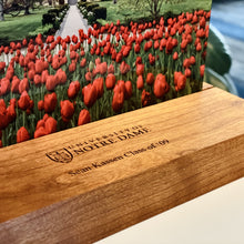 Load image into Gallery viewer, The photo (6" x 8") is printed on aluminum and sits in a cherry wood base (9" long) which is engraved with the University of Notre Dame seal and your student or graduate's name and class year!
