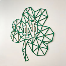 Load image into Gallery viewer, This Green Geometric Notre Dame Shamrock Wall art measures 24" x 24" x 1/4" and is laser cut from green-stained birch.