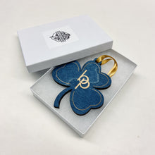 Load image into Gallery viewer, This Breen-Phillips Hall Christmas Ornament is made from Notre Dame blue-stained birch, laser-engraved, and is 3.25" in diameter.
