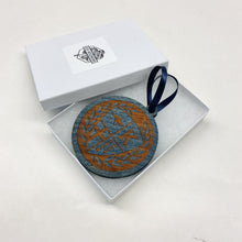 Load image into Gallery viewer, This Keough Hall Christmas Ornament is made from laser-engraved and is 3.25" in diameter.