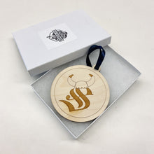 Load image into Gallery viewer, This Siegfried Hall Christmas Ornament is made from unstained birch, laser-engraved, and is 3.25" in diameter.