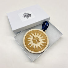 Load image into Gallery viewer, This Sorin College Christmas Ornament is made from unstained birch, laser-engraved, and is 3.25" in diameter.