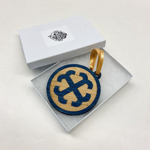 Load image into Gallery viewer, This Saint Mary's Christmas Ornament is made from blue-stained birch, laser-engraved, and is 3.25" in diameter.