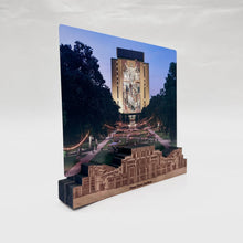 Load image into Gallery viewer, The included 8" x 10" photo is printed on aluminum and highlights the view of Hesburgh Library across the quad from the Stadium. The stand is engraved with "Notre Dame Stadium" and measures 10" x 2 1/2" x 1 1/2".