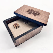 Load image into Gallery viewer, The pair of cufflinks are engraved with a Notre Dame monogram on one and the ND Leprechaun on the other, along with your Notre Dame graduate's initials. The cufflinks themselves are solid sterling silver and are of the highest quality. Cufflinks measure 5/8" square.