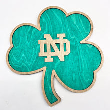 Load image into Gallery viewer, This Premium Notre Dame Monogram on Green Shamrock Wall Art is currently available in two sizes: Small (12"), Medium (18") and Large (30").
