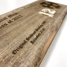 Load image into Gallery viewer, Saint Mary's College Stadium Bench Plaques are engraved with your chosen name, class year (or year became a fan) and the Saint Mary's Cross. The 16" x 7 1/2" plaque is also engraved with the following text: "Original Stadium Seating 1930 Removed 2016".