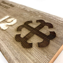 Load image into Gallery viewer, Saint Mary's College Stadium Bench Plaques are engraved with your chosen name, class year (or year became a fan) and the Saint Mary's Cross. The 16" x 7 1/2" plaque is also engraved with the following text: "Original Stadium Seating 1930 Removed 2016".