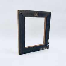 Load image into Gallery viewer, These frames are available in landscape or portrait, are engraved with a "gold-leaf" Notre Dame Monogram above and your message or personalization can be added below. Glass and backing are included.