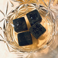 Load image into Gallery viewer, The engraved Notre Dame Whiskey Stones are presented in a laser-cut, handmade box, crafted from walnut wood and engraved with the ND Monogram. The stones are .75" square and the box measures 4" x 3" x 2.25".