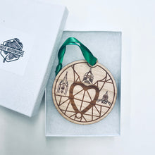 Load image into Gallery viewer, This ornament is made from cherry wood, laser-engraved, and is 3.25" in diameter.