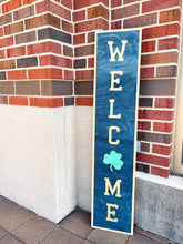 Load image into Gallery viewer, This Notre Dame "Welcome" Porch Leaner  is carefully crafted from THREE layers of 1/4" birch, making it extremely sturdy and built to last. Measuring 46" x 10" x 3/4", this Notre Dame Porch Leaner will be clearly visible to all who enter!