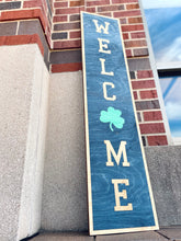Load image into Gallery viewer, This Notre Dame "Welcome" Porch Leaner is carefully crafted from THREE layers of 1/4" birch, making it extremely sturdy and built to last. Measuring 46" x 10" x 3/4", this Notre Dame Porch Leaner will be clearly visible to all who enter!
