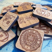 Load image into Gallery viewer, Each 1.75" square piece in this quality wooden game is laser cut from natural cherry, laser-engraved, and finished by hand.