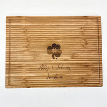 Load image into Gallery viewer, This premium cutting board is made from bamboo and measures 15.75" x 11.75" x .75".