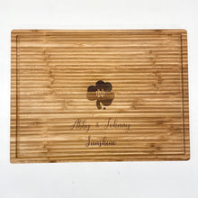 Load image into Gallery viewer, This premium cutting board is made from bamboo and measures 15.75" x 11.75" x .75".