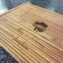 Load image into Gallery viewer, This premium cutting board is made from bamboo and measures 15.75" x 11.75" x .75".