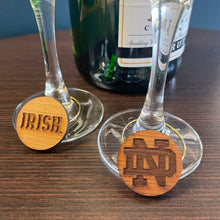 Load image into Gallery viewer, These 5-charm set is laser-cut from Notre Dame Stadium Bench Wood.