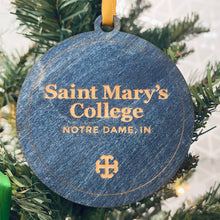 Load image into Gallery viewer, This Saint Mary's Christmas Ornament is made from blue-stained birch, laser-engraved, and is 3.25" in diameter.