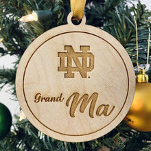 Load image into Gallery viewer, Each ornament in this Notre Dame Grandma & Grandpa Christmas Ornament Set is made from birch, laser-engraved, and 3.25" in diameter.