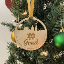 Load image into Gallery viewer, Commemorate the graduation year of an esteemed Notre Dame alum with this excellent ornament!