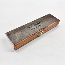Load image into Gallery viewer, Our Notre Dame Stadium Bench Wood Cigar Box features gold-colored hinges, and has magnetic closures to keep cigars safe and sound. When closed the box measures 9.5" x 2.75" x 1.5".