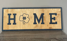 Load image into Gallery viewer, Our 24&quot; x 9&quot; x 1/2&quot; Premium Notre Dame HOME Horizontal Sign comes in two color ways: Gold on Blue
