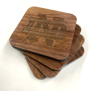 This Notre Dame Coaster Set is crafted from walnut hard wood, and portrays the most iconic of ND logos: The Monogram, The Shamrock, the Leprechaun, and the block IRISH. Each coaster measures 3.5