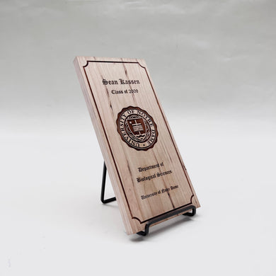 This cherry wood plaque is laser engraved with the Notre Dame Seal. A metal stand will be included with the 10