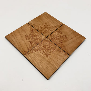 This specialized coaster set is a laser etching of the mosaic on the floor of the Golden Dome.