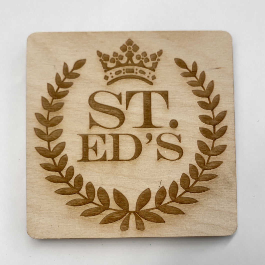 This St Edward's Hall Coaster Set is crafted from birch, laser-engraved, and each coaster measures 3.5